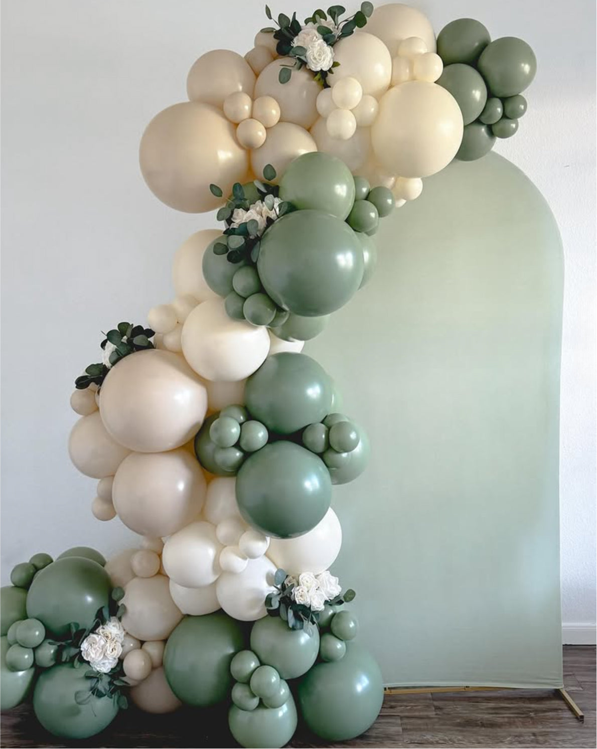 Single Chiara wall panel with pastel balloon garland setup for baby shower